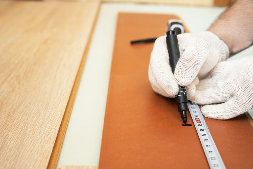 Close up. Measurement of laminate flooring